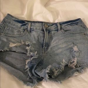 Denim shorts with rips